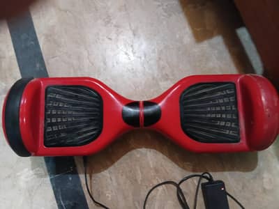 Hoverboard in red jist like new. No fault & never repaired.