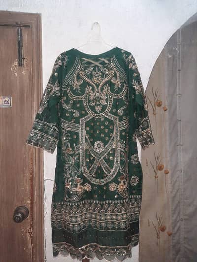 Shaadi heavy dress Green and golden organza