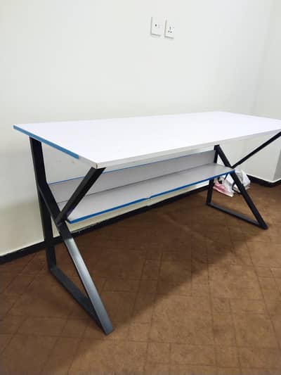 white table with matle frame