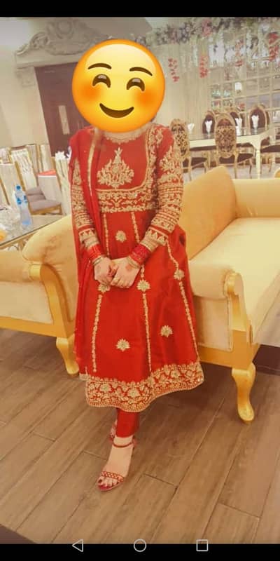 A Raw silk Frock with golden embroidary and chiffon dupata