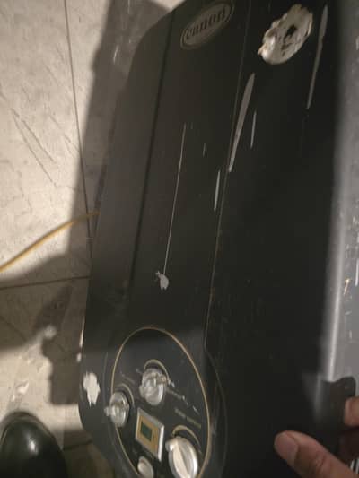 Canon used gas instant geyser