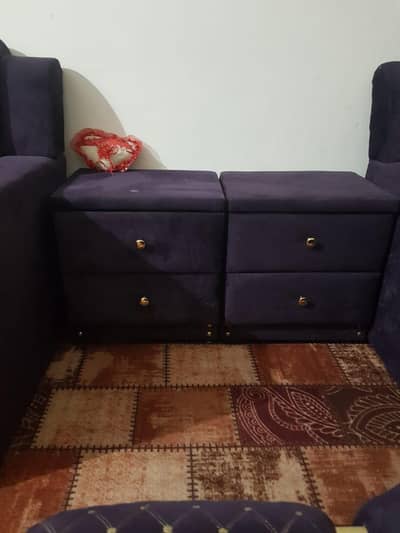 double bed and five seater sofa set and two tables