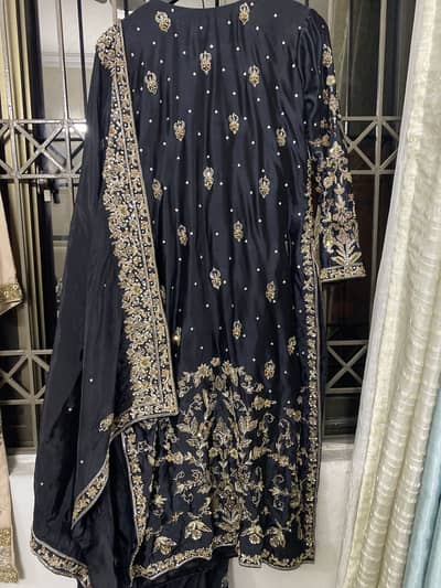 Elegant black embellished outfit