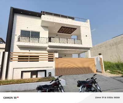 1. "Brand New 10 Marla House for Sale in MPCHS C Block"