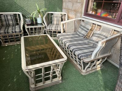 Wooden and cane sofa set with tables