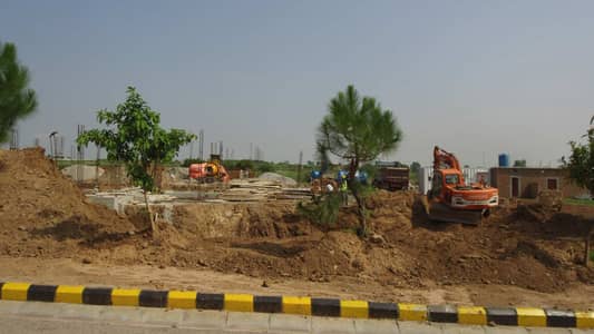 10 Marla Beautiful N Heighted Location Plot Near by Houses