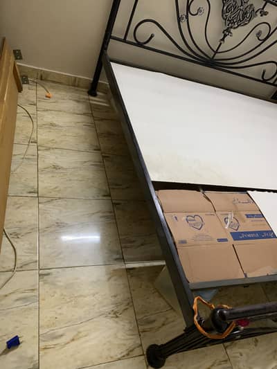 Iron bed with mattress