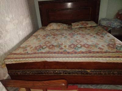 wooden double bed