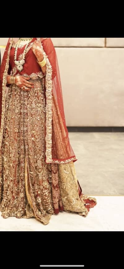 Bridal Lehnga in meroom & golden with heavy embroidery &  7 layers