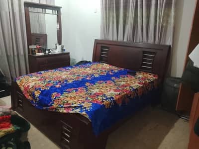 Bed and dressing table