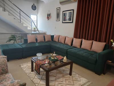 Stylish 7 Seater L-Shaped sofa in Emerald Green- Very good condition