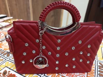 maroon hand bang and cross body bag beautiful with rhinestones