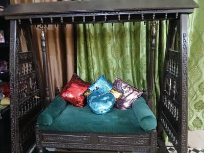 wooden jhoola(swing), with handcrafted design and very Antique look.