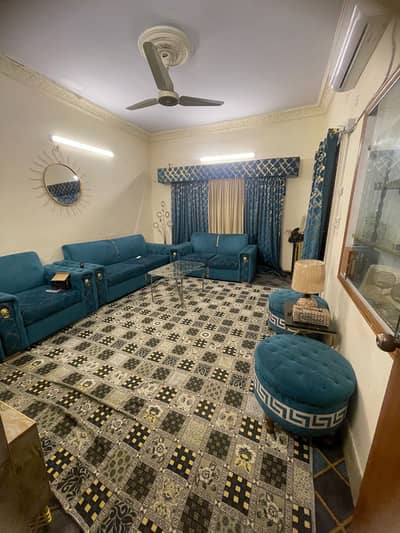 Complete sofa set with curtains carpet and media wall