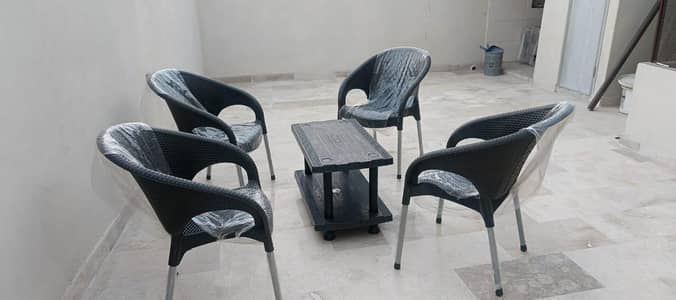 4 Plastic Chairs with Table Set Available only in 3,900 Pkr