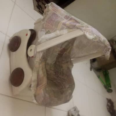 3 in 1 carry cot chair and rocker.