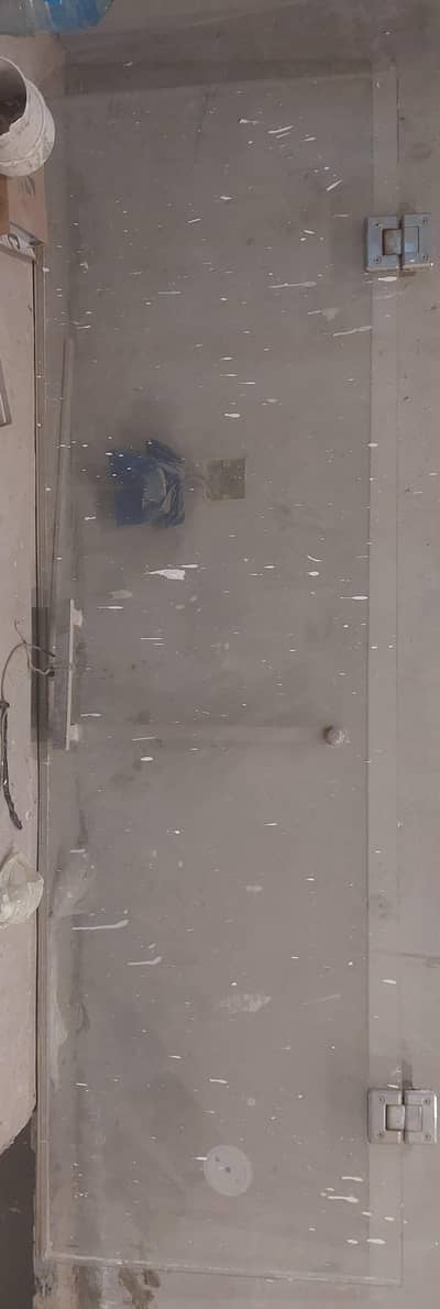 TEMPERED GLASS DOOR.