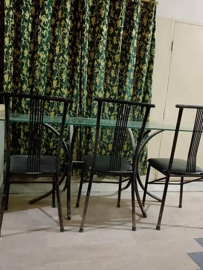 Rod iron dinning table for sell with top thick glass