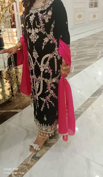 Heavy Dabka and Jewellery work fancy velvet dress.