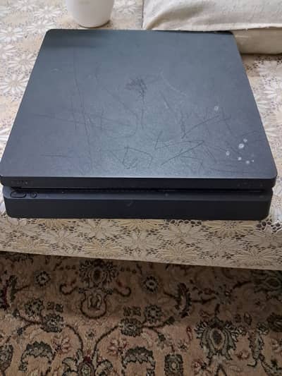 Ps4 slim used 256GB only little scratches with two games resident evil