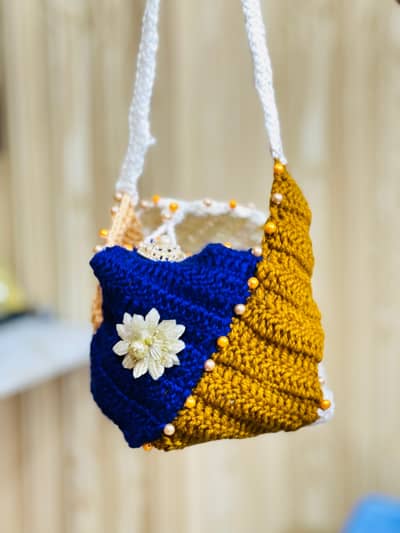 Totally Hand made nitted purse for girls negotiable price