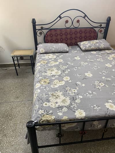 Bed with side tables