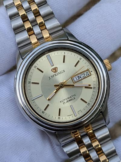 j. spring by seiko Y-676-C automatic 21jewels Swiss made