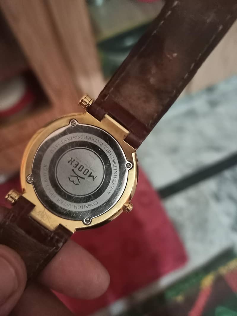 modex watch. . . 1