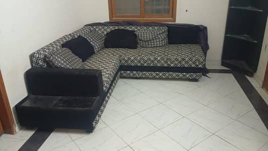 Black and white L shape sofa