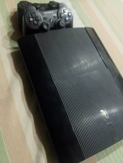 playstation 3 super slim with 2 controllers