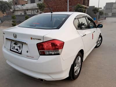 Lady Doctor used Antique Honda City 2014 M/T, B 2 B Genuine Loc LHR