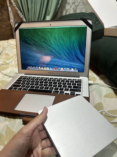 MacBook Air (2014) slightly used along with an unused Apple CD Player