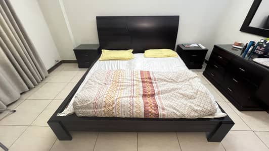 King size bed with 2x side tables and 1x dressing table with mirror