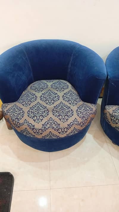 Two single seater sofas