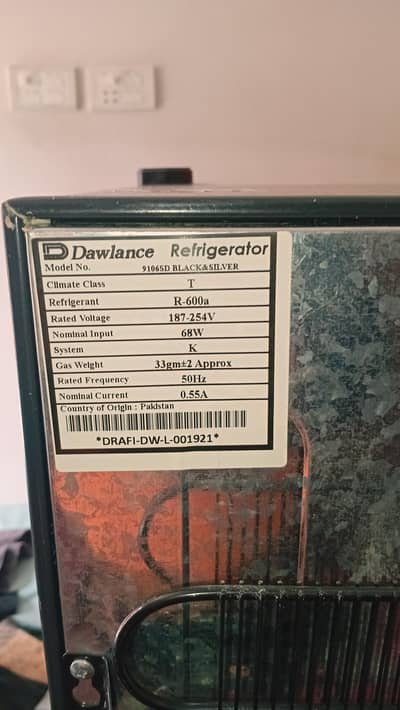 Dawlance Redrigerator , Model 9106 black and silver