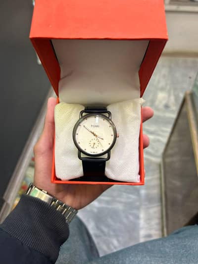 tomi watch
