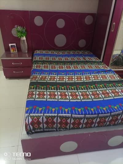 single bed with side table