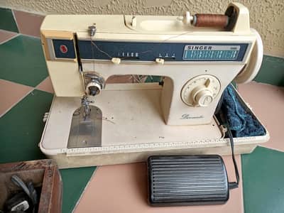 singer machine discmatic
