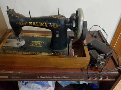 Salika original sewing machine with handle and motor