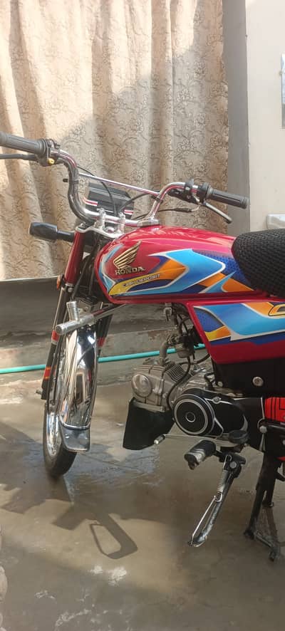 Honda CD 70 2026 Red color
