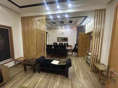 Beautifully Maintained 1 Kanal Ground Portion DHA Sector F (Prime Location)