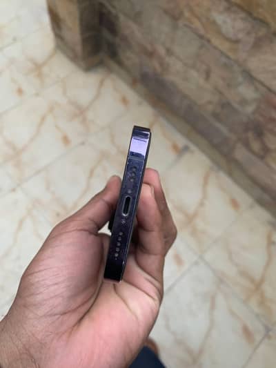 iphone 14 pro, purple color,128 gb,79%b. h 10/9 condition