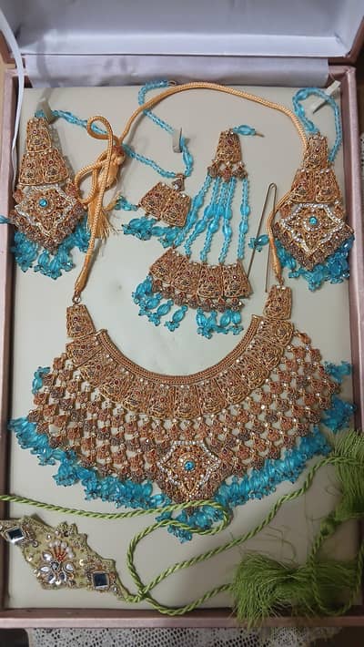 Bridal lehnga with pouch and jewellery