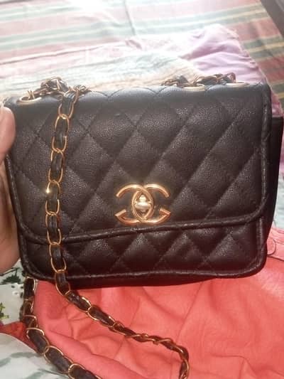 channel crossbody  or  Rosettie Crossbody