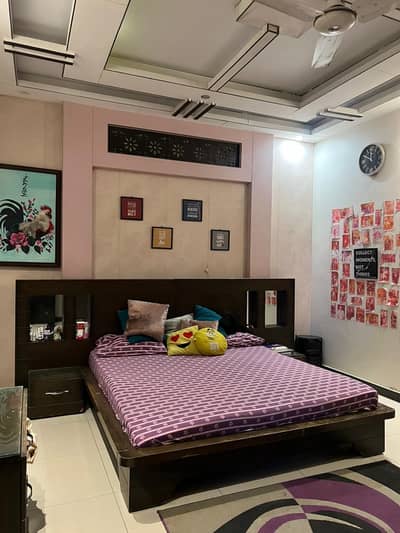 King size bed set with 2 sidetable cupboard and a dressing table