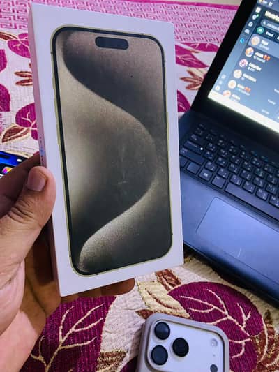 iPhone 15 pro max natural titanium 256gb