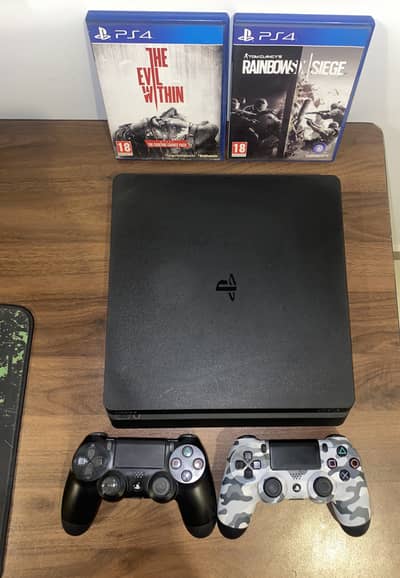 PS4 Slim 500GB (Excellent Condition) + 2 Controllers + 2 Games