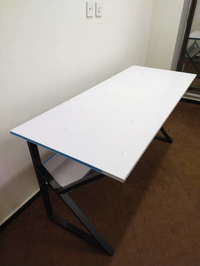 table with metal frame/white colour