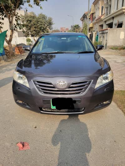 selling Toyota Camry 2008 grey colour 10/9