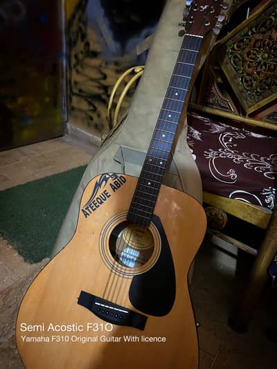 Yamaha Semi Acoustic F310 Original Guitar with licences